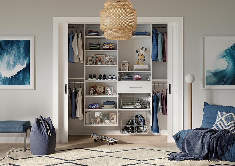 Custom closet for teen with storage space in a coastal design by California Closets