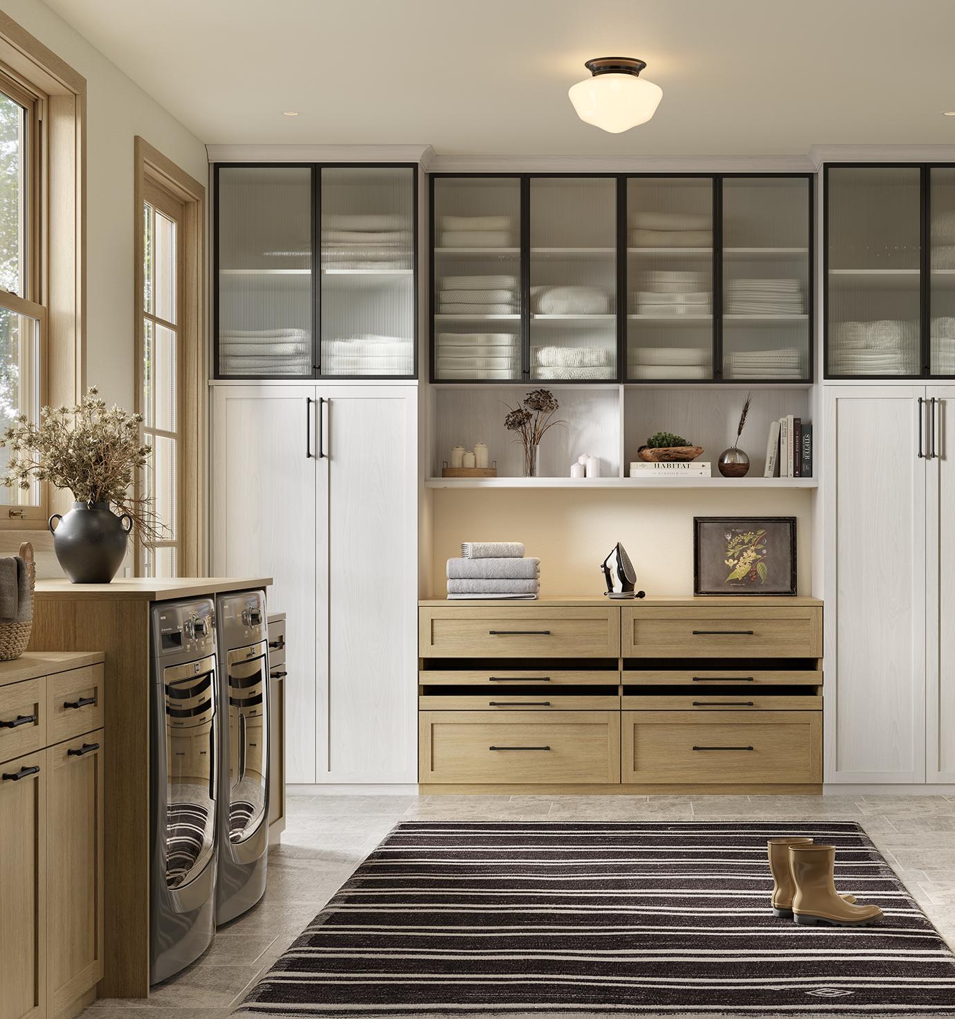 Custom entryway laundry room storage space with custom cabinets by California Closets