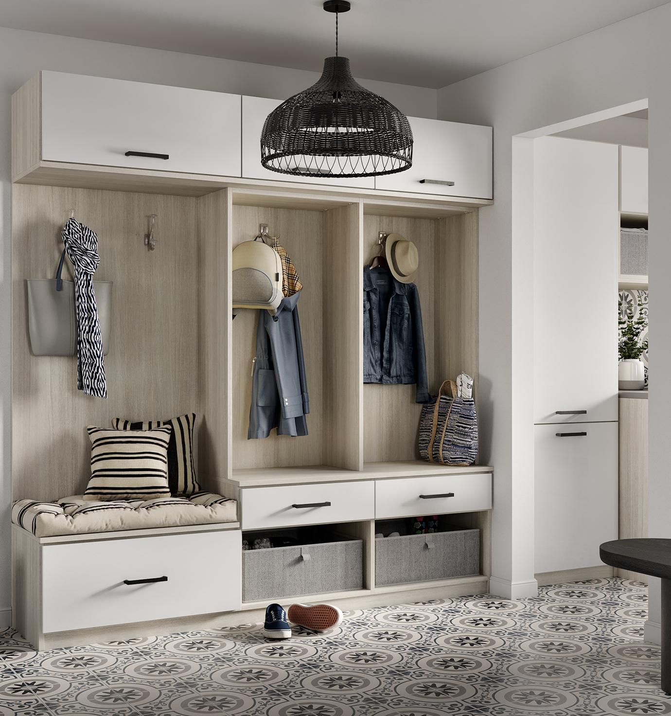 Built in mudroom storage with cabinets, drawers and bench by California Closets