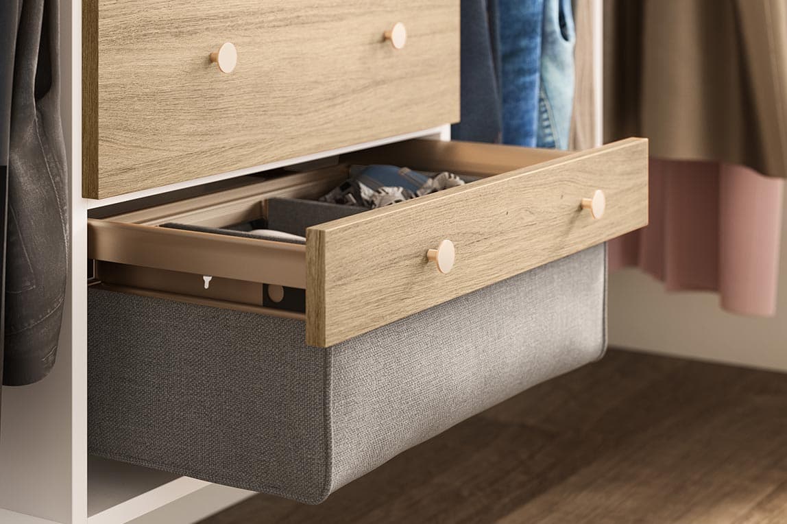 Custom cabinets built in dresser in a light wood finish from California Closets