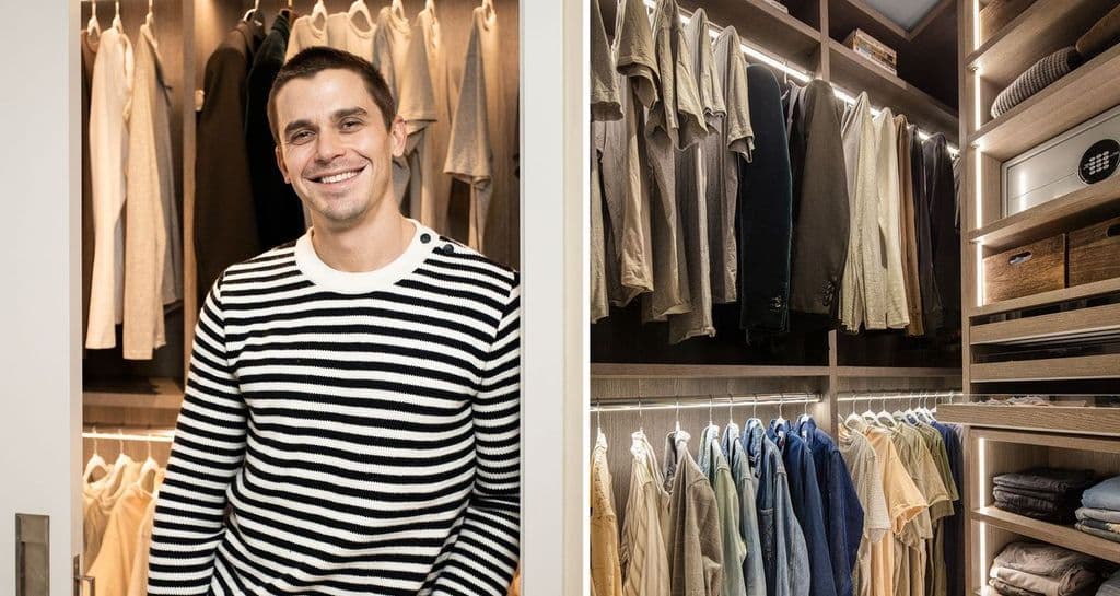 Antoni Porowski in his newly designed walk in closet with custom shelves and drawers in a light wood grain finish by California Closets
