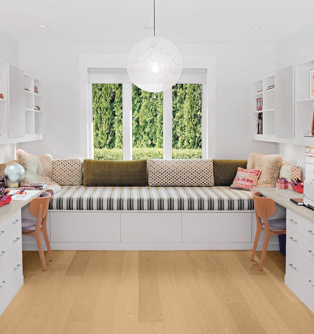 Large space for family home office stations with window bench storage by California Closets