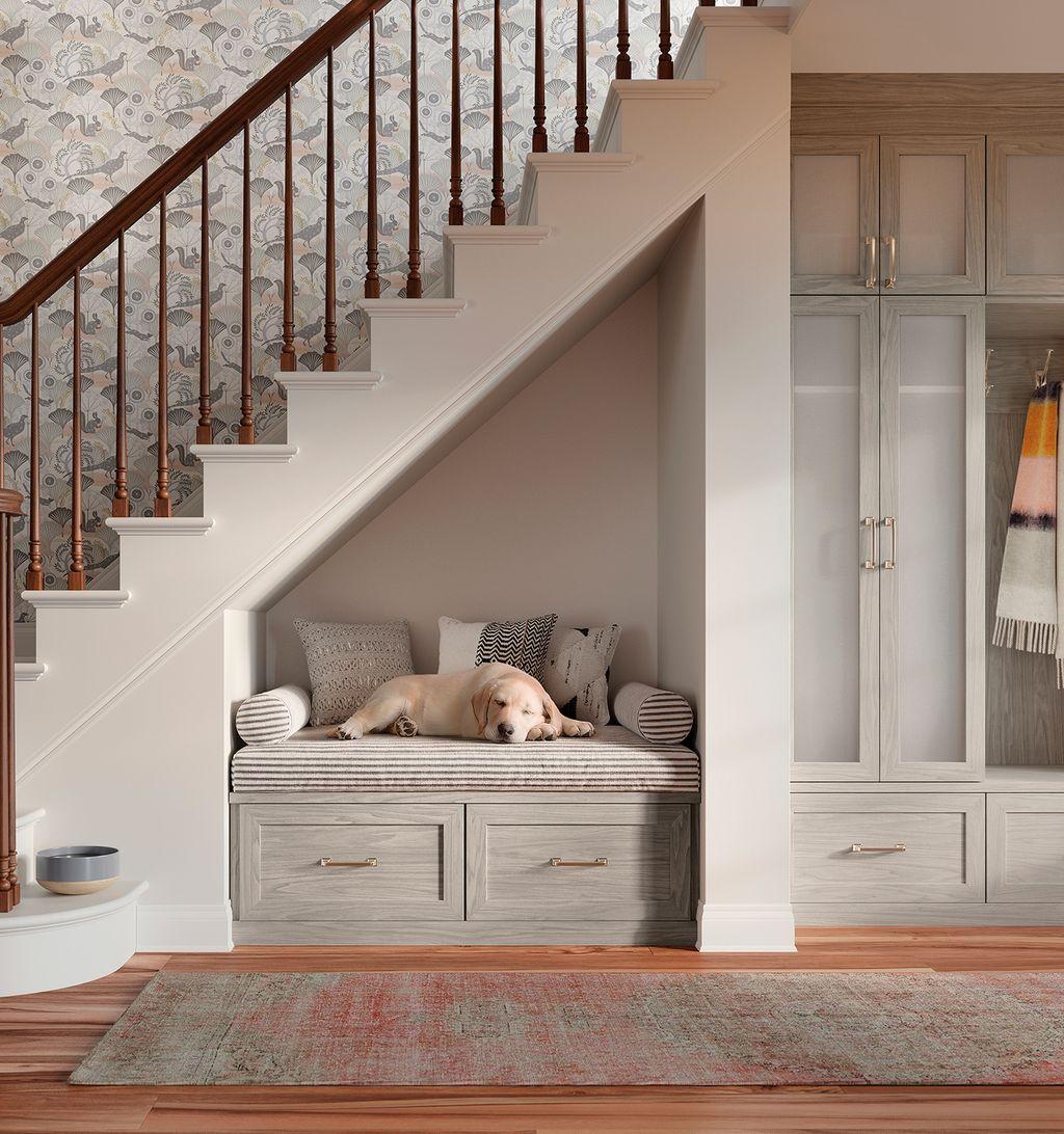 Entrance with large closet storage and pet bench in light grey finish by California Closets