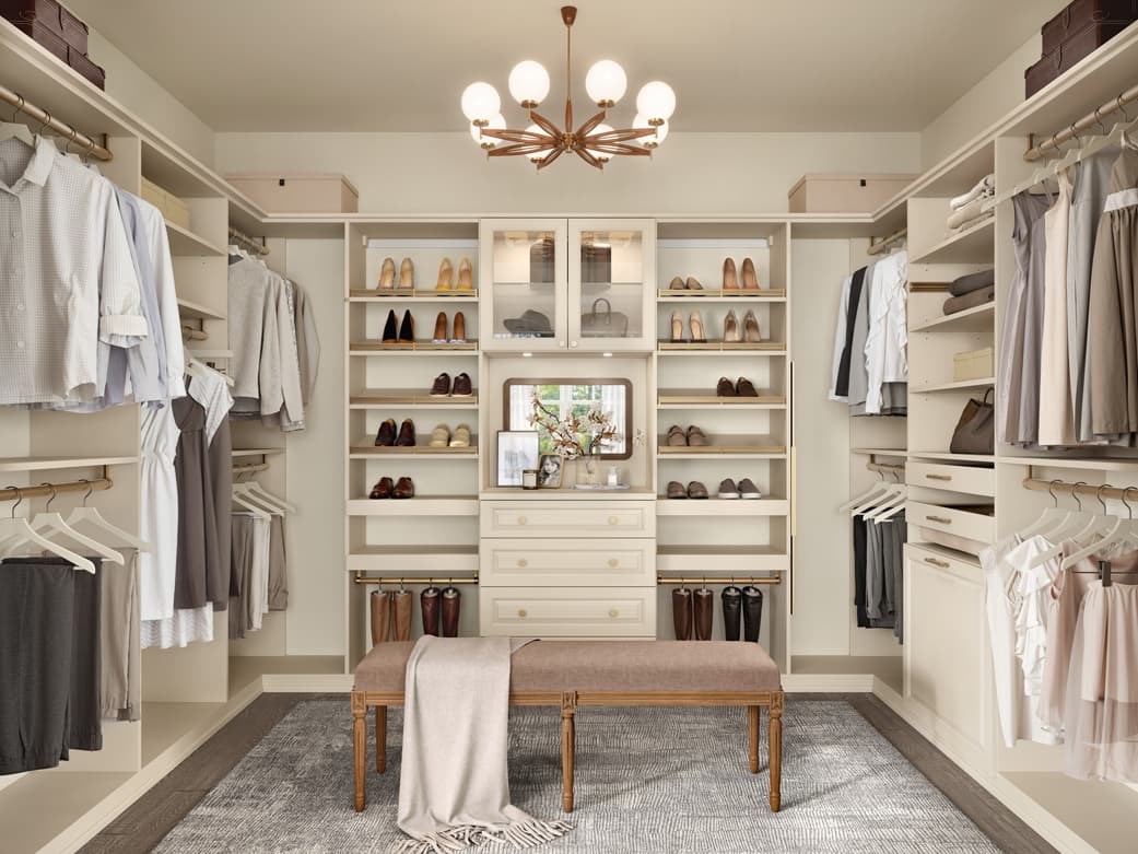 U-Shaped open closet to floor with flat drawers, pull out baskets and shoe shelving by California Closets