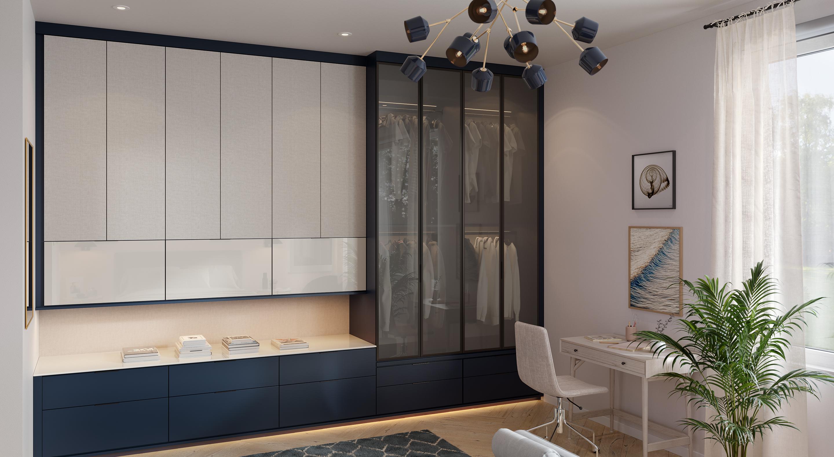 Wardrobe closet with additional storage designed in a navy blue matte finish, glass closet doors and pull out drawers.