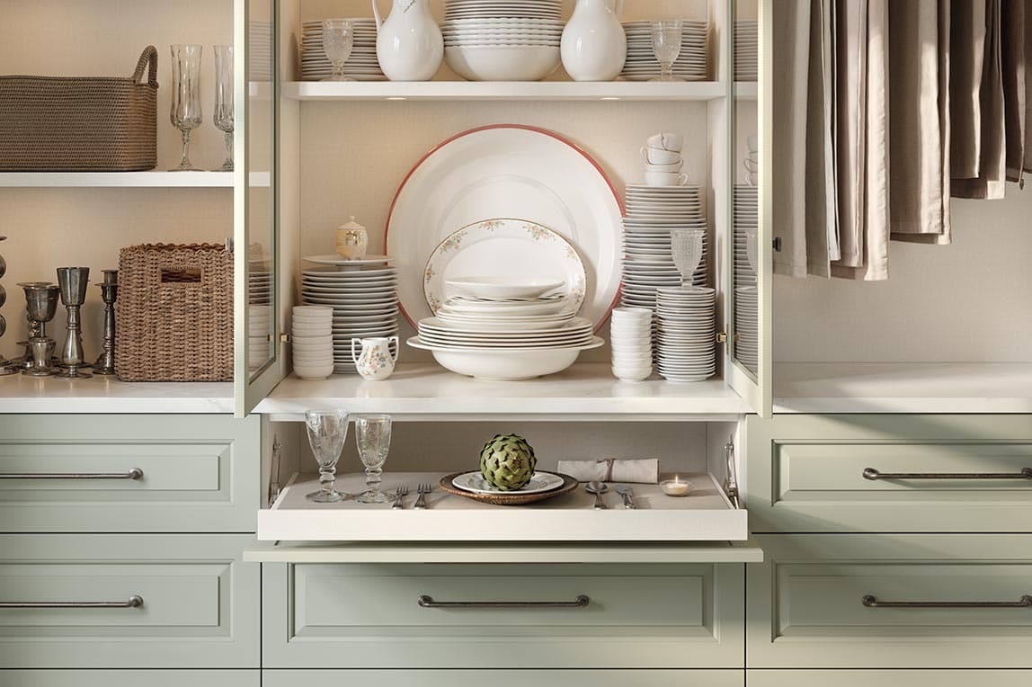 Custom open kitchen pantry design with puck lighting for storage by California Closets