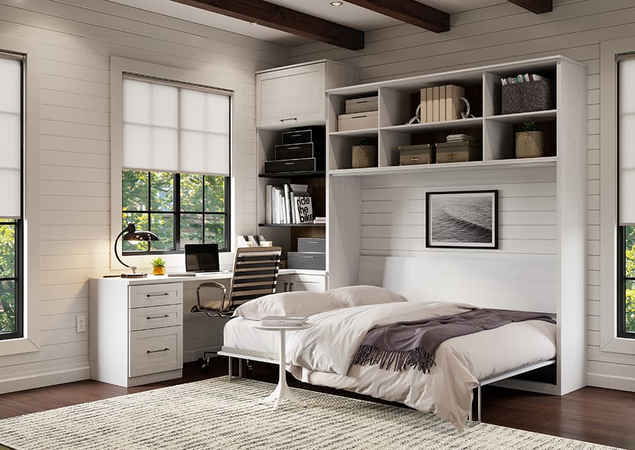 Murphy bed opens horizontally with desk and office storage in white finish by California Closets