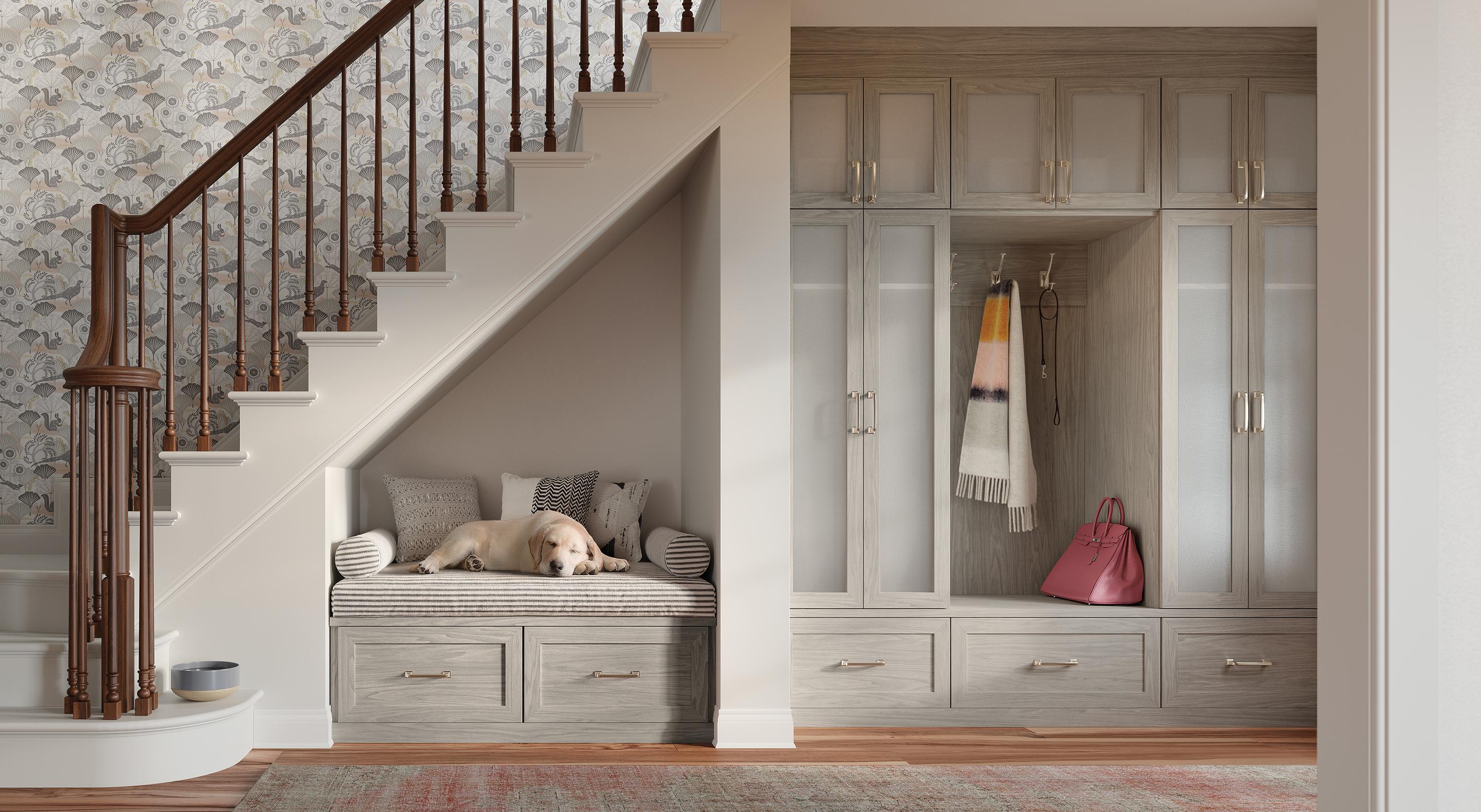 Home entryway with closet and bench storage solultions in light finish by California Closets